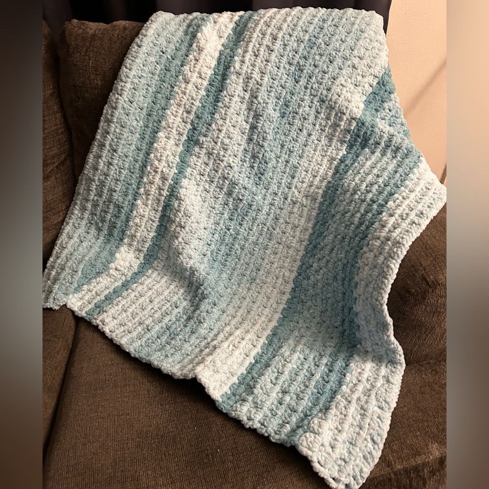handcrafted blanket measures 47 inches by 36 inches